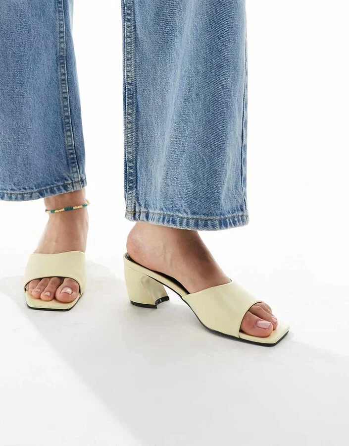 RAID Saanvi block heeled mules in butter yellow
