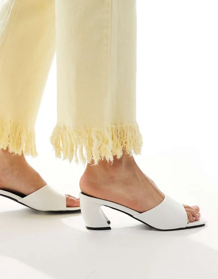 RAID Saanvi block heeled mules in white