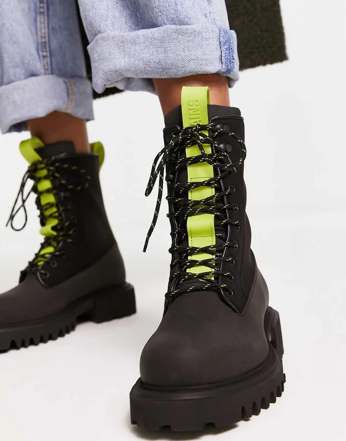 Rains combat lace up boots in black
