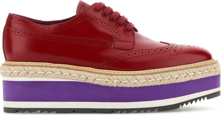 Red leather lace-up shoes