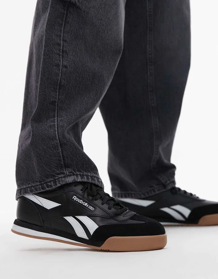 Reebok Campio XT sneakers in black and white with rubber sole