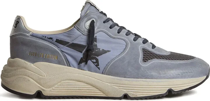 Running sole star-embellished leather sneakers