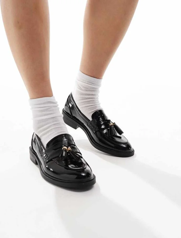 schuh Lane tassel loafers in black patent