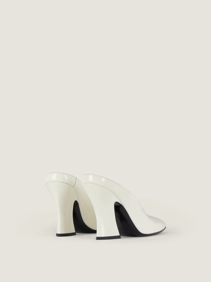 Sculpted heeled mules in patent leather - Image 9
