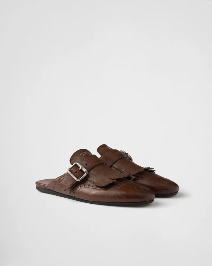 Shuffle fringed leather mules
