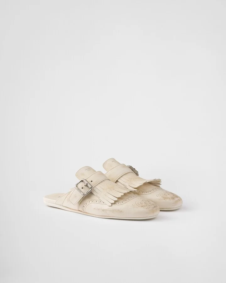 Shuffle fringed leather mules