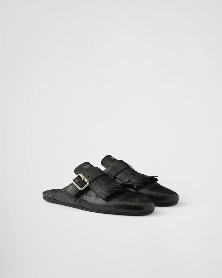 Shuffle fringed leather mules