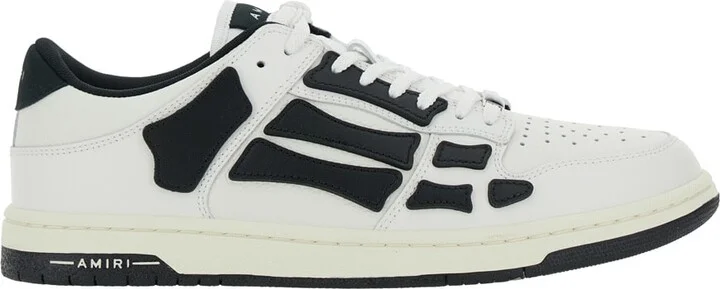 'skel Top Low' Black And White Sneakers With Logo Patch On Thetongue And Contrasting Details On The Side In Leather Man