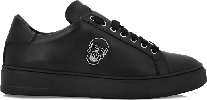 Skull-appliqué leather sneakers