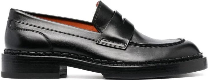 Sleek Black Leather Loafers With Refined Stitching