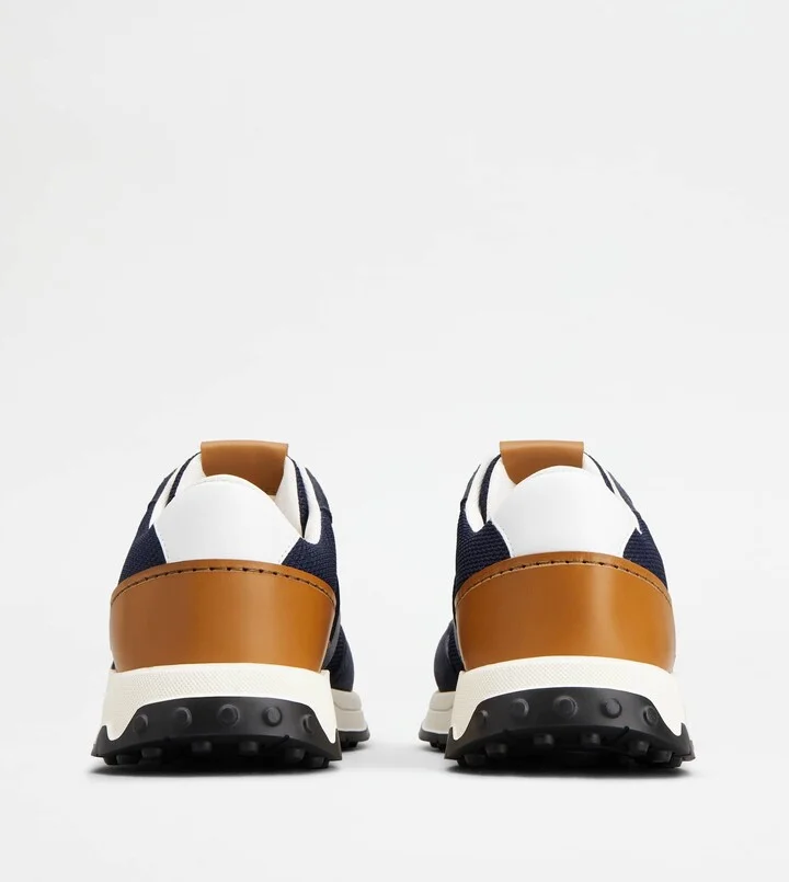 Sneakers in Leather and Technical Fabric - Image 3