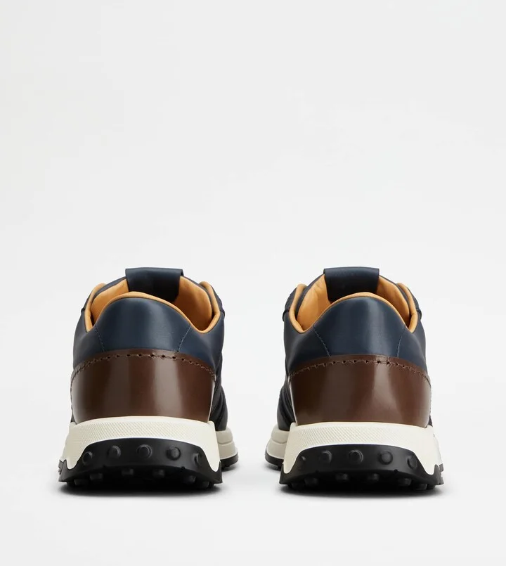 Sneakers in Leather and Technical Fabric - Image 3