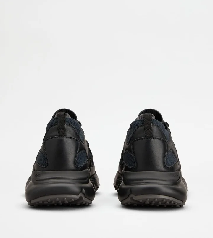 Sneakers in Leather and Technical Fabric - Image 3