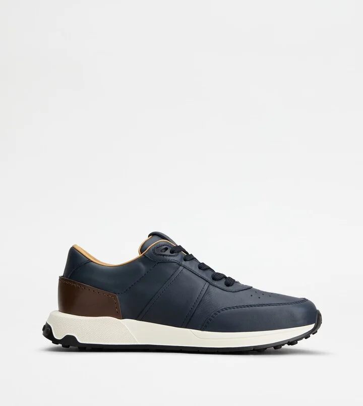 Sneakers in Leather and Technical Fabric