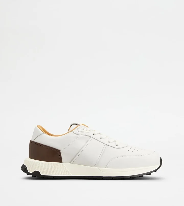 Sneakers in Leather and Technical Fabric