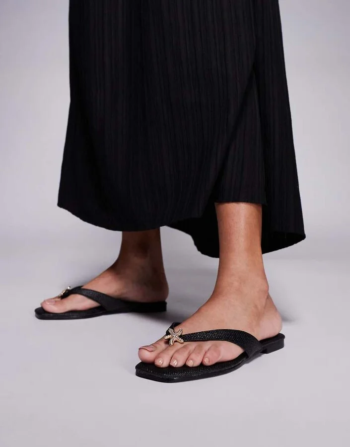 South Beach Flip Flop with Star Embelishment in Black Raffia
