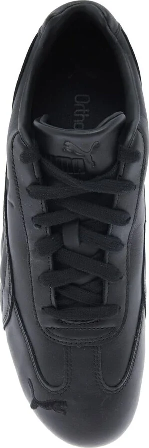 'Speedcat' Black Low Top Sneakers With Embossed Logo On The Tongue And Contrasting Sole In Leather Unisex - Image 4