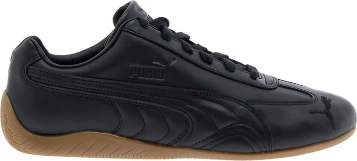 'speedcat' Black Low Top Sneakers With Embossed Logo On The Tongue And Contrasting Sole In Leather Unisex