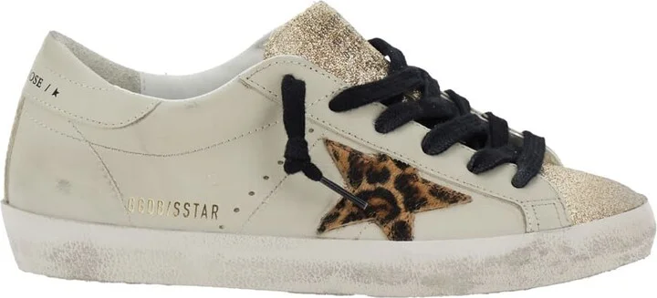 'superstar' White Low Top Sneakers With Glittered Star Patch And Laminated Heel With Logo Lettering In Leather Woman