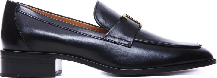 T plaque loafers