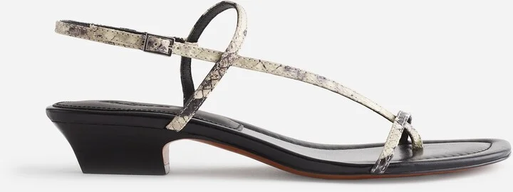 The Maycie Asymmetric T-Strap Sandal in Stamped Leather