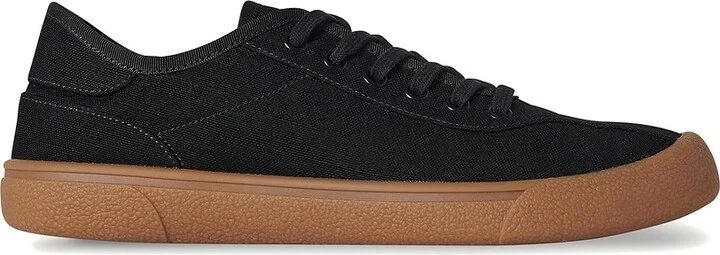 The Row Canvas Sneaker in Black