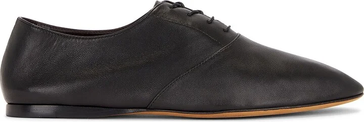 The Row Hereditas Lace Up Flat in Black
