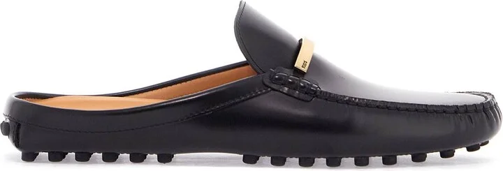 TOD'S black calfskin slip-on loafers with metallic strap and rubber sole
