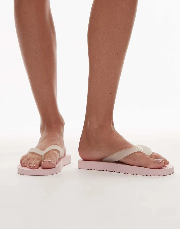 Tommy Jeans logo flip flops in baby pink