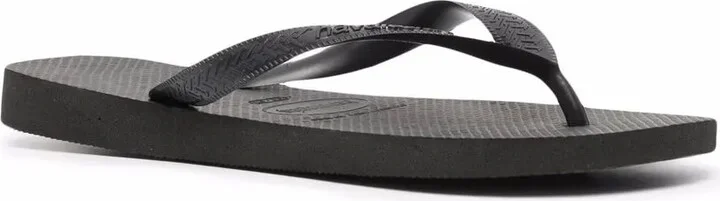 Top logo-embossed flip flops - Image 2