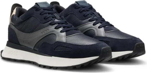 Trainers in tumbled leather with supportive outsole
