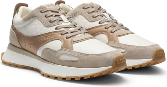 Trainers in tumbled leather with supportive outsole