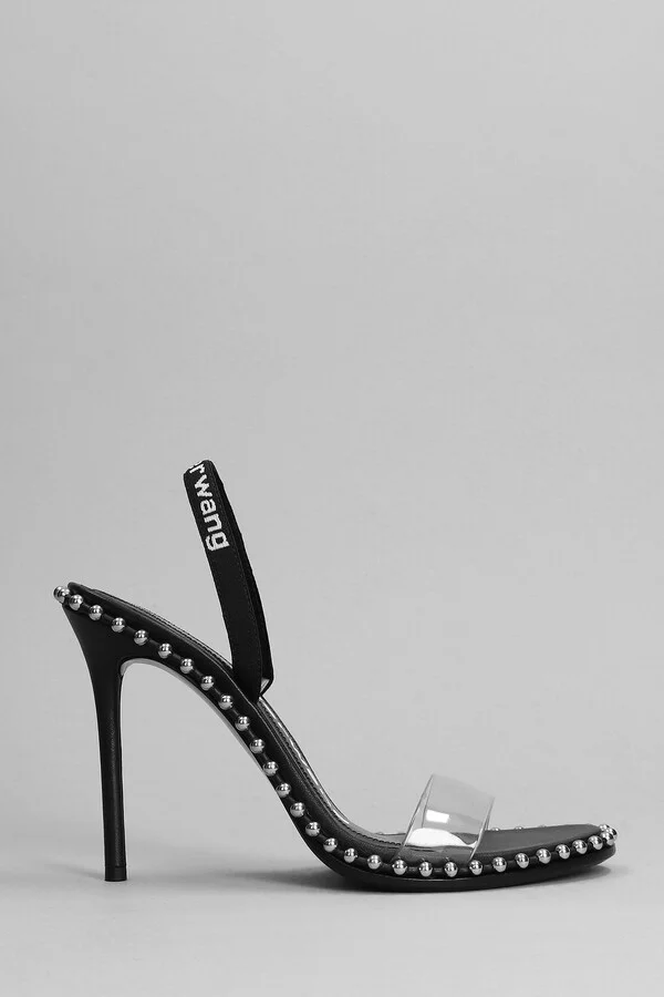 Two-tone leather and PVC sandals