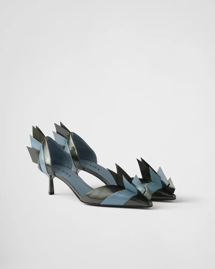 Two-tone patent leather D'Orsay pumps