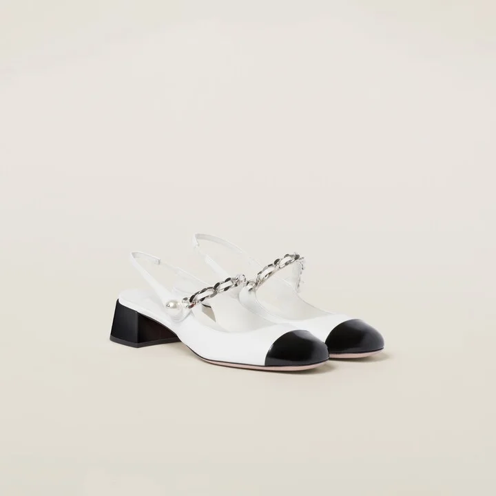 Two-tone patent leather slingback pumps