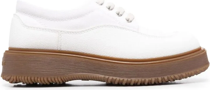 Untraditional chunky sole brogues