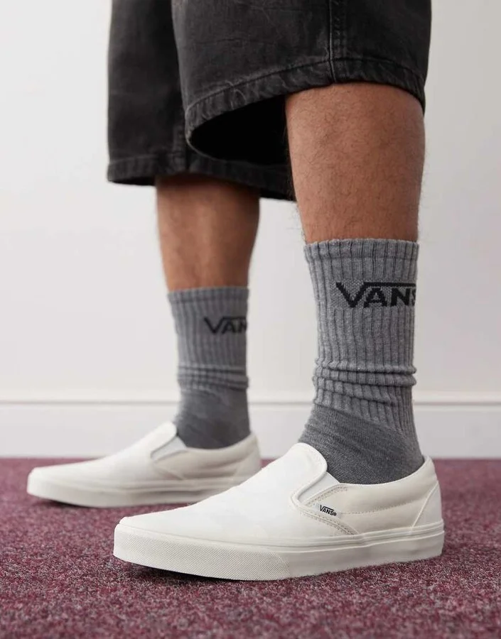 Vans Classic Slip-On sneakers in white checkerboard