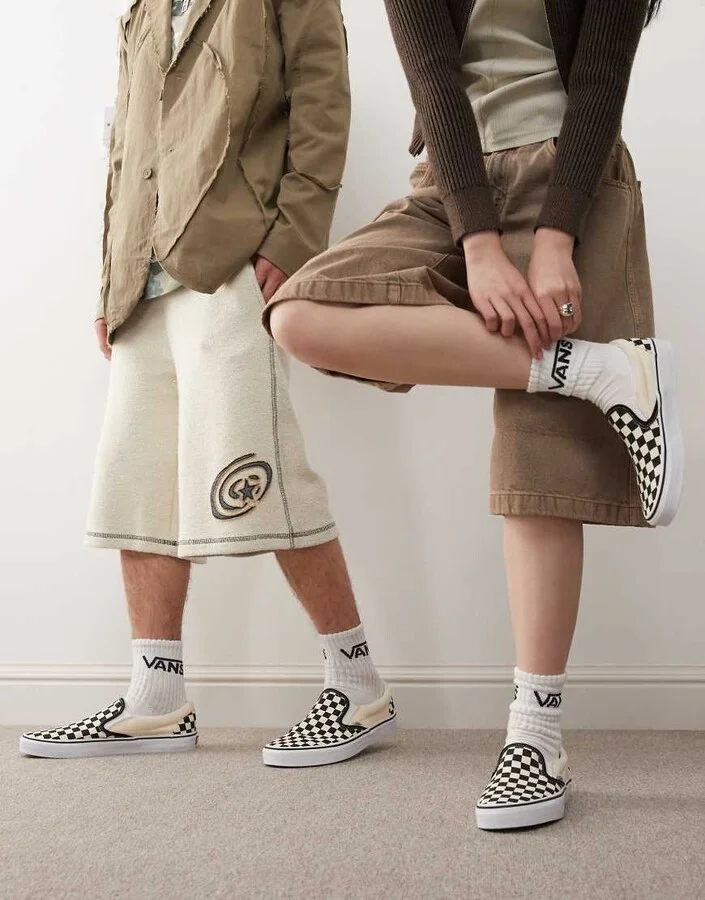 Vans Slip-On checkerboard sneakers in black and white