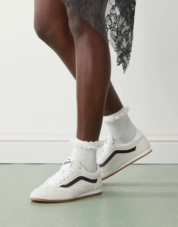 Vans Super Lowpro sneakers in white and black
