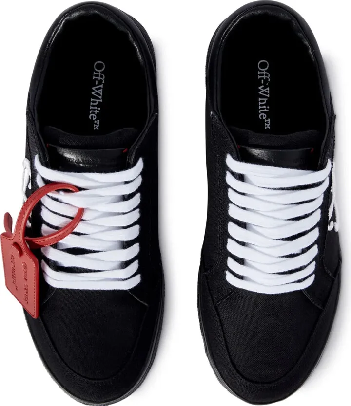Vulcanized contrasting-tag canvas sneakers - Image 4