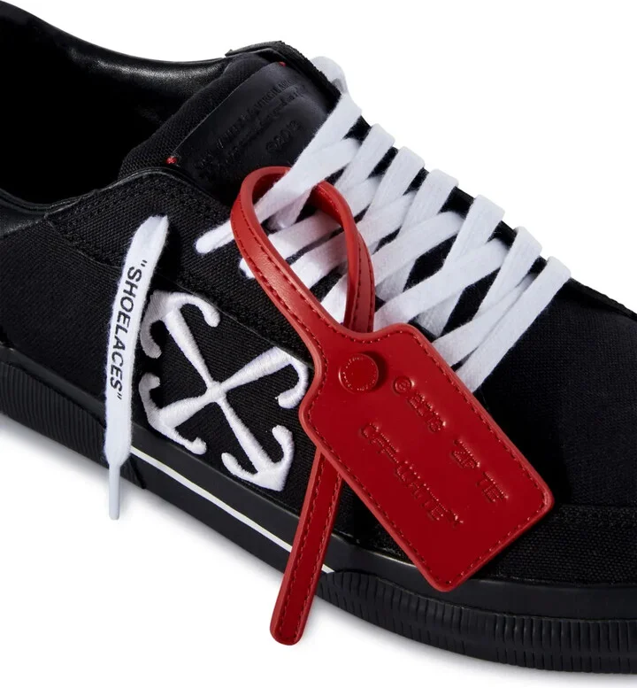Vulcanized contrasting-tag canvas sneakers - Image 5
