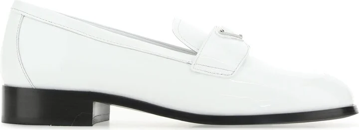 White leather loafers
