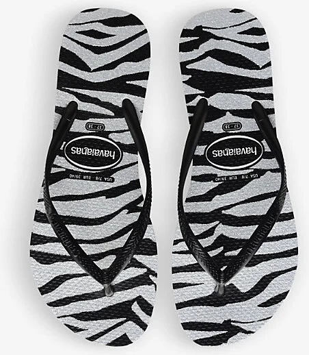Womens Black Slim Zebra-Print Rubber Flip-Flops 1/2 - Image 2