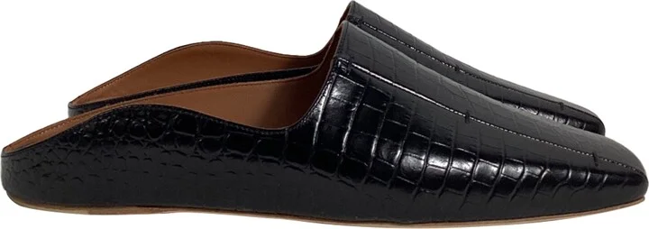 x Deveaux Embossed Mules in Black Leather