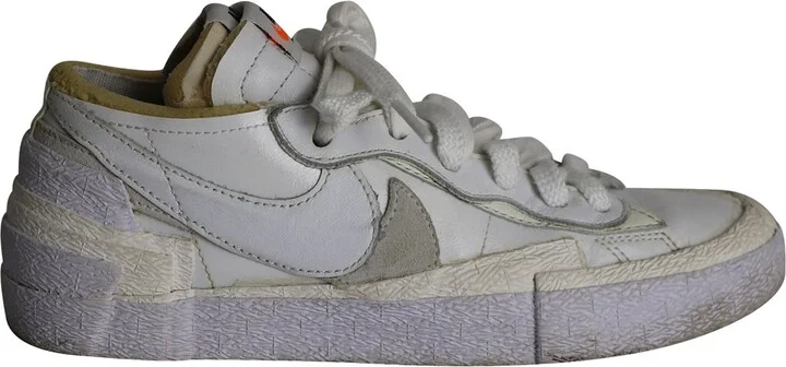 x Sacai Blazer Low Sneakers in White Patent Leather